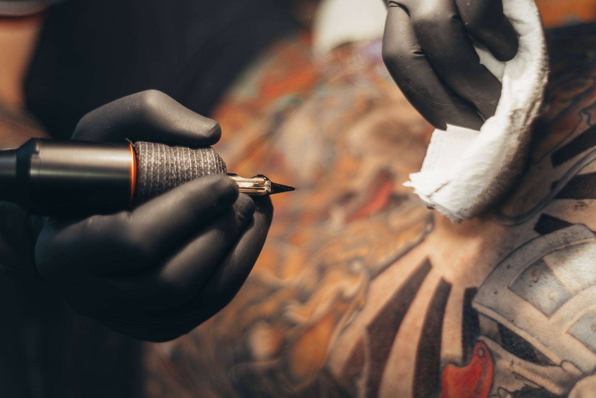 Close up of the tattoo machine. Tattooing.